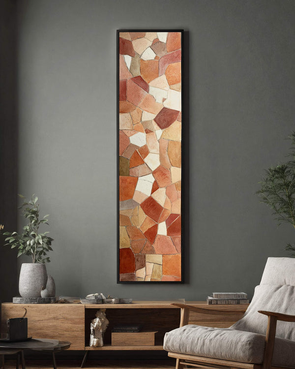 Vertical canvas wall art in interior setting.