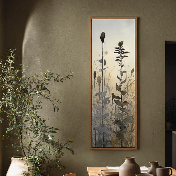 Vertical canvas wall art in interior setting.