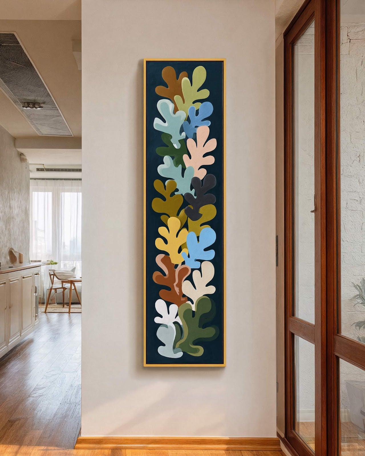 Vertical canvas wall art in interior setting.