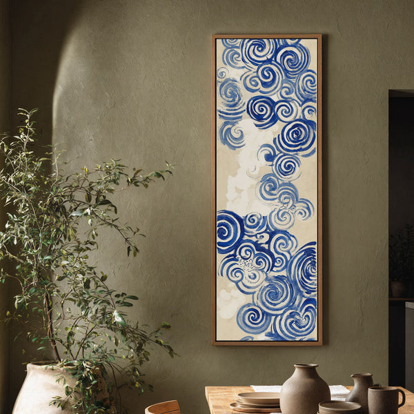 Vertical canvas wall art in interior setting.