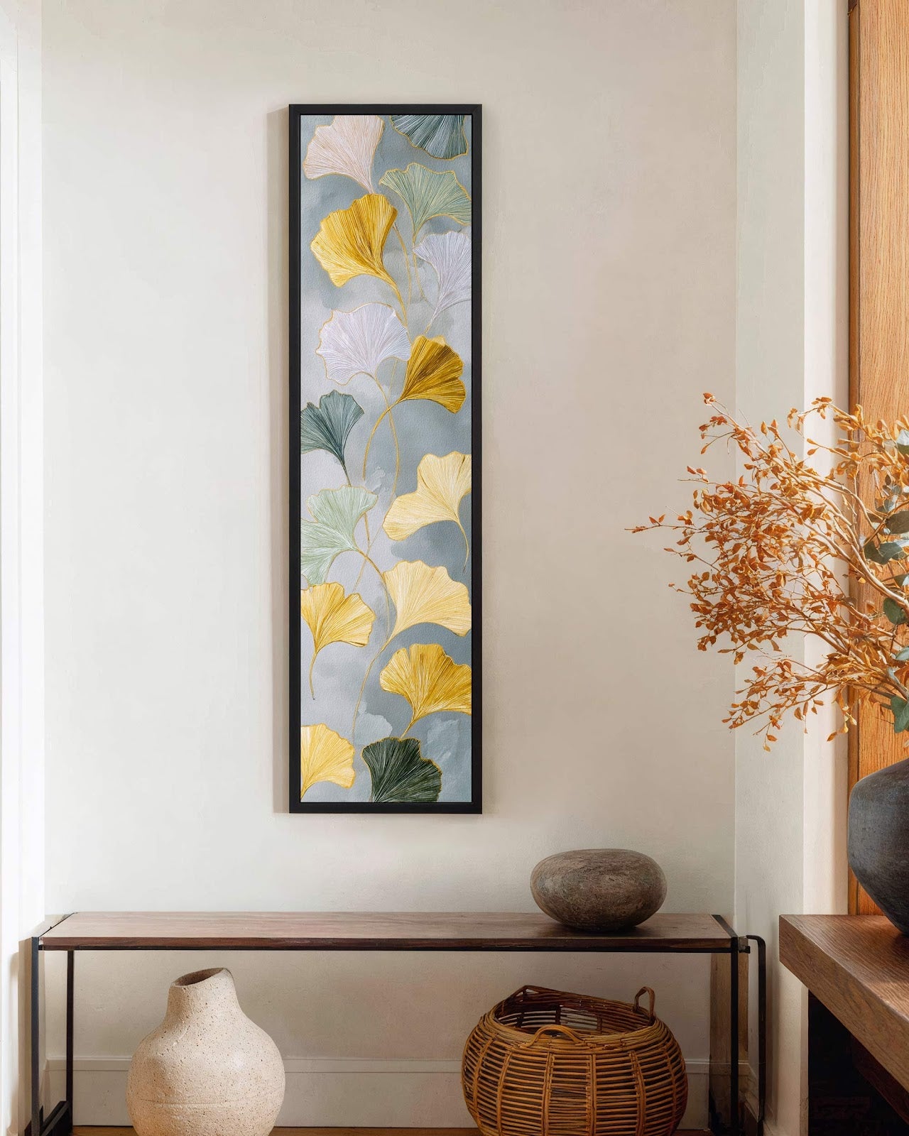 Vertical canvas wall art in interior setting.