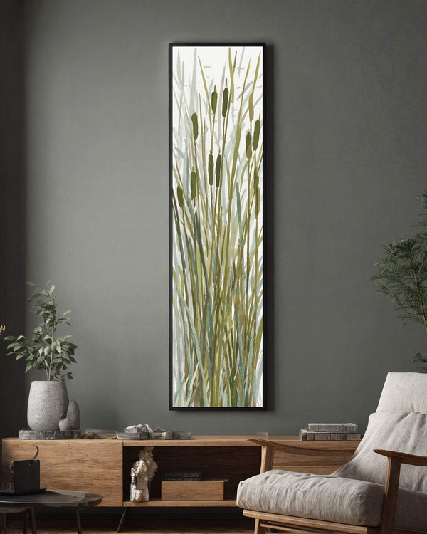 Vertical canvas wall art in interior setting.