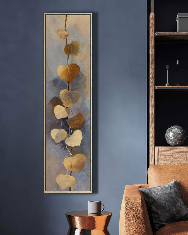 Vertical canvas wall art in interior setting.