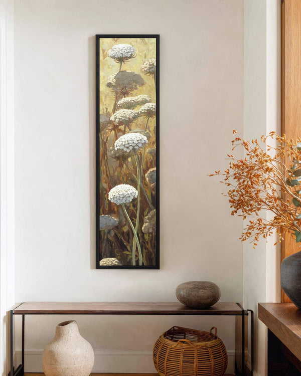 Vertical canvas wall art in interior setting.