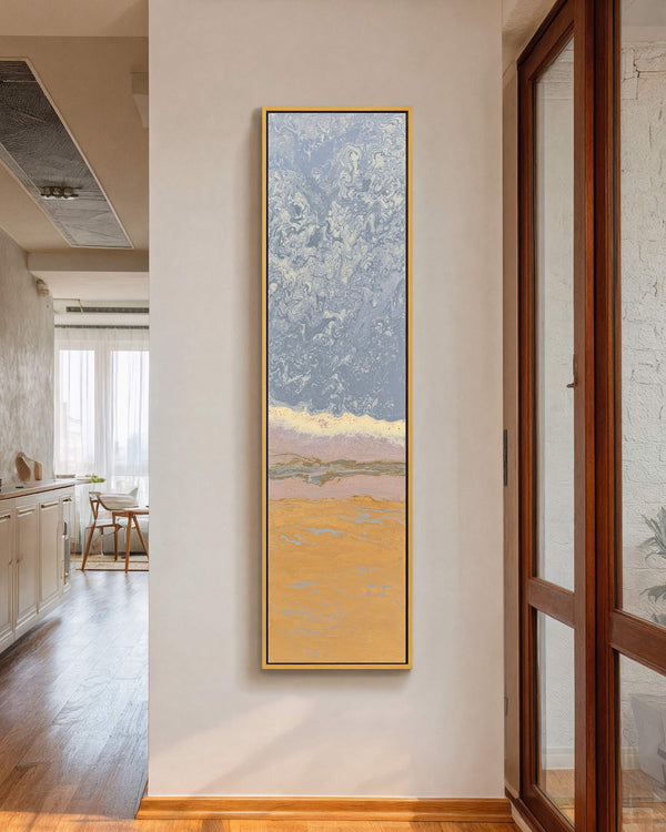 Vertical canvas wall art in interior setting.