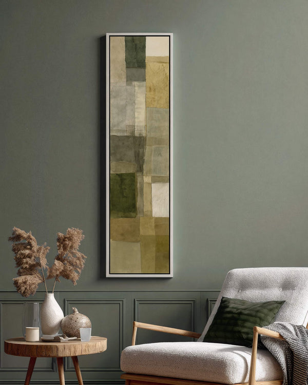 Vertical canvas wall art in interior setting.