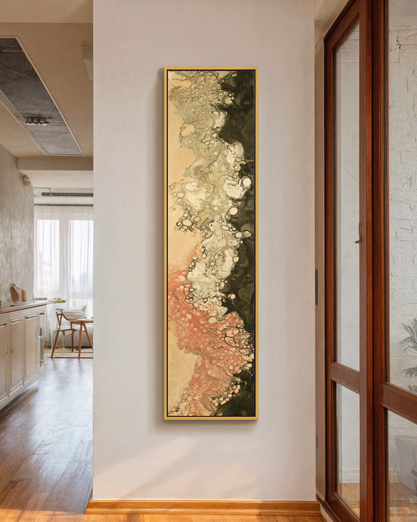 Vertical canvas wall art in interior setting.