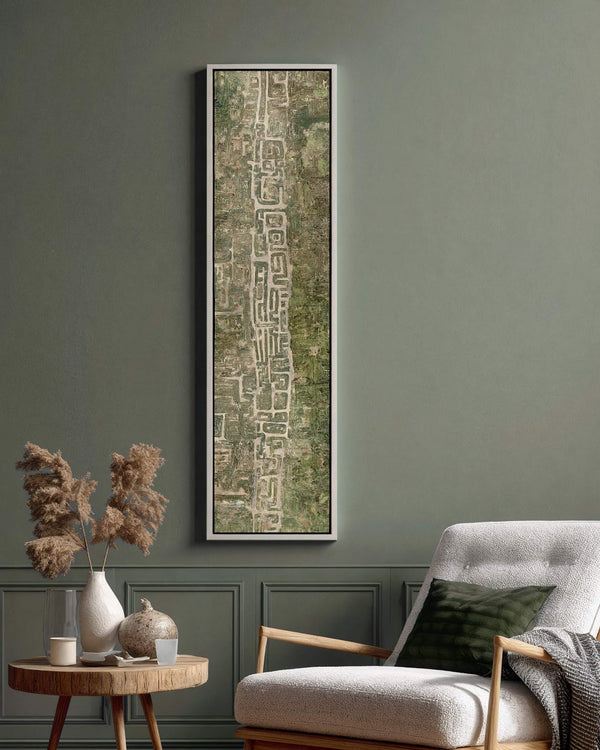 Vertical canvas wall art in interior setting.