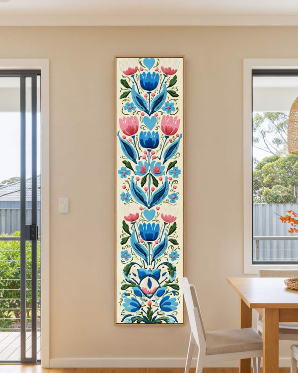 Vertical canvas wall art in interior setting.