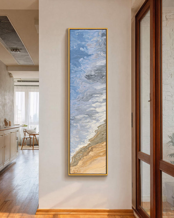 Vertical canvas wall art in interior setting.