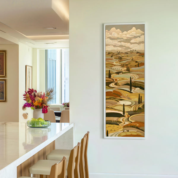 Vertical canvas wall art in interior setting.