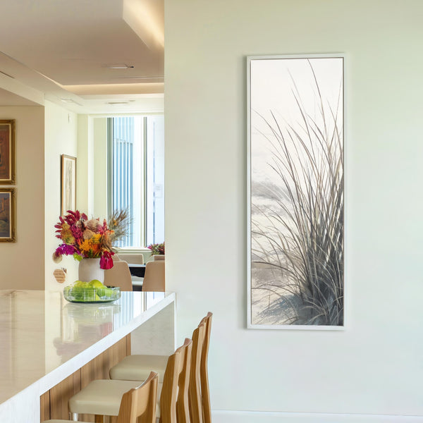 Vertical canvas wall art in interior setting.