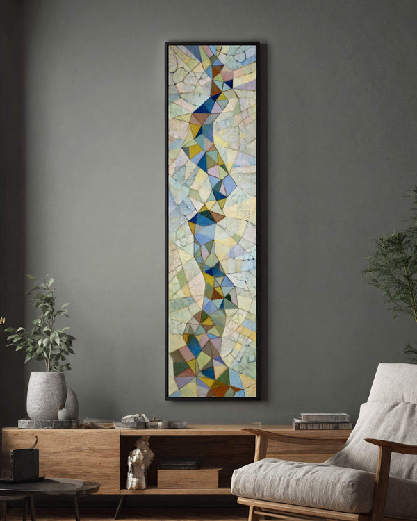 Vertical canvas wall art in interior setting.