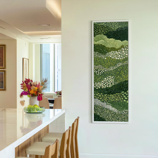 Vertical canvas wall art in interior setting.