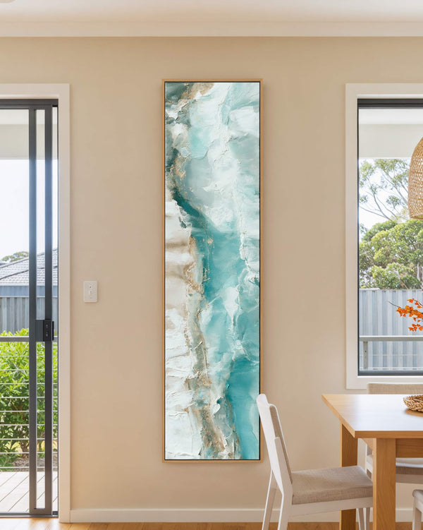 Vertical canvas wall art in interior setting.