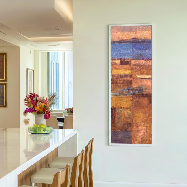 Vertical canvas wall art in interior setting.