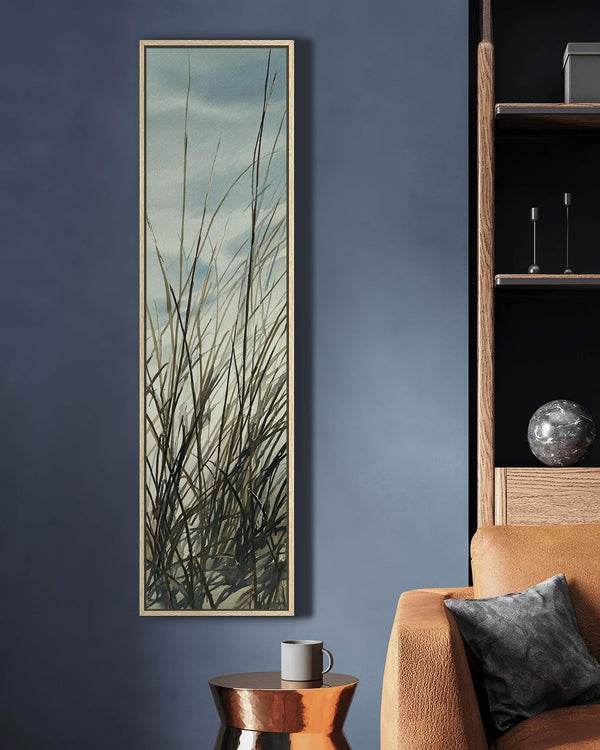 Vertical canvas wall art in interior setting.