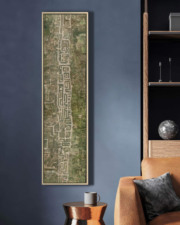 Vertical canvas wall art in interior setting.