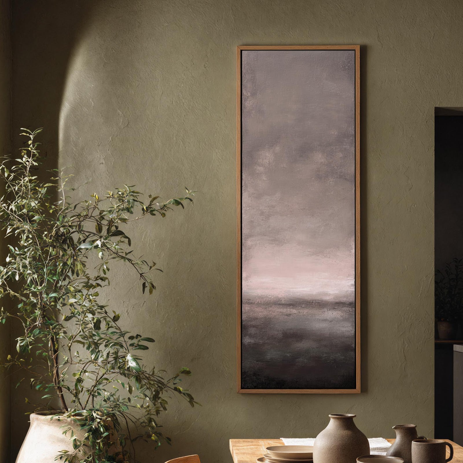 Vertical canvas wall art in interior setting.
