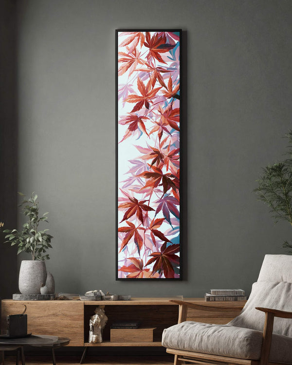 Vertical canvas wall art in interior setting.