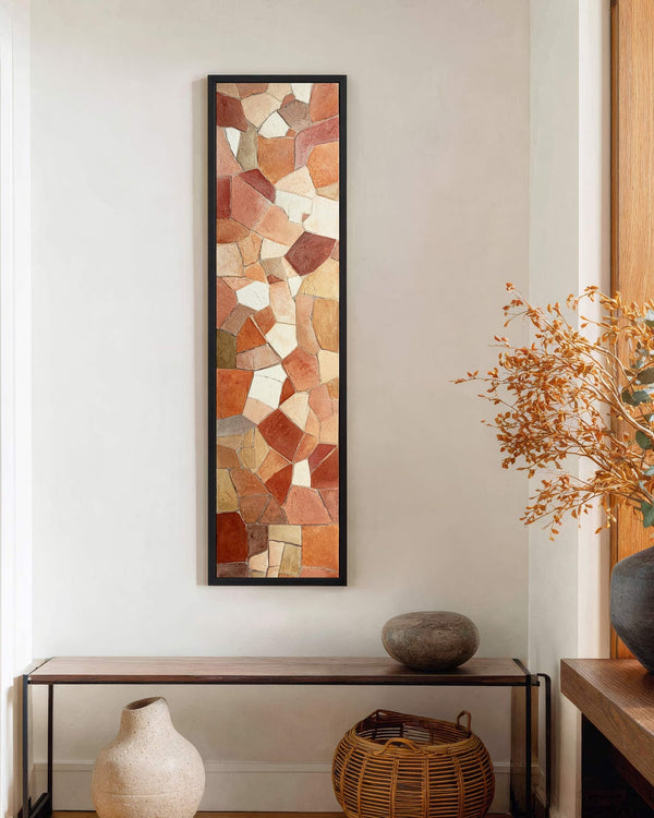 Vertical canvas wall art in interior setting.