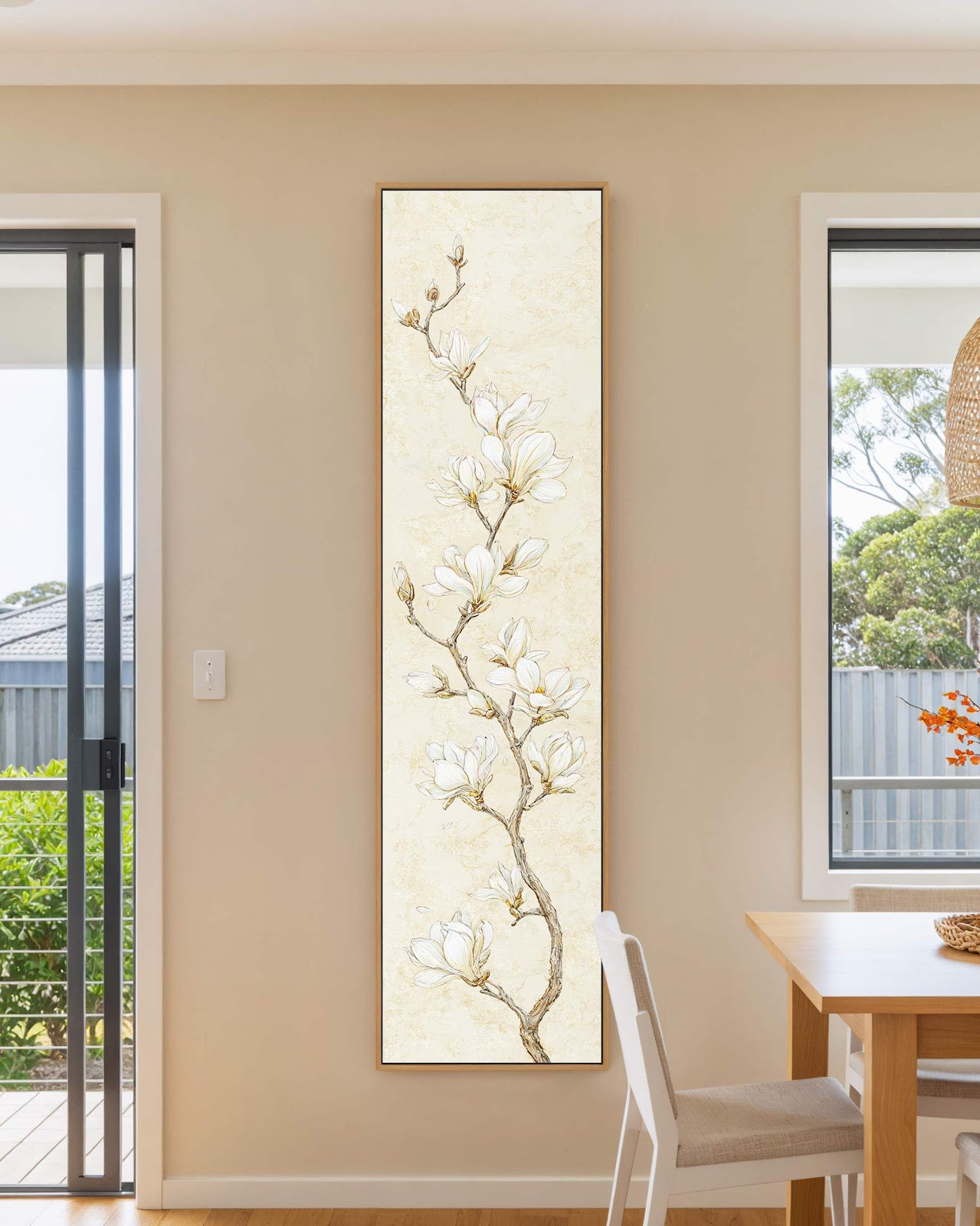 Vertical canvas wall art in interior setting.