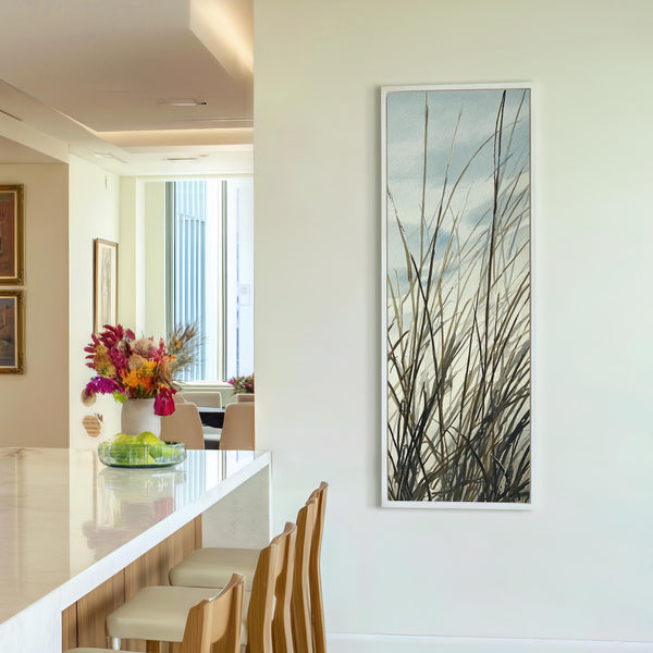 Vertical canvas wall art in interior setting.