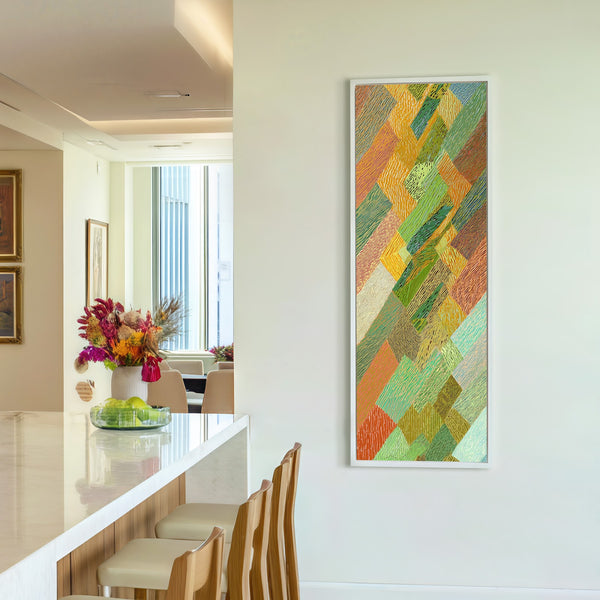 Vertical canvas wall art in interior setting.