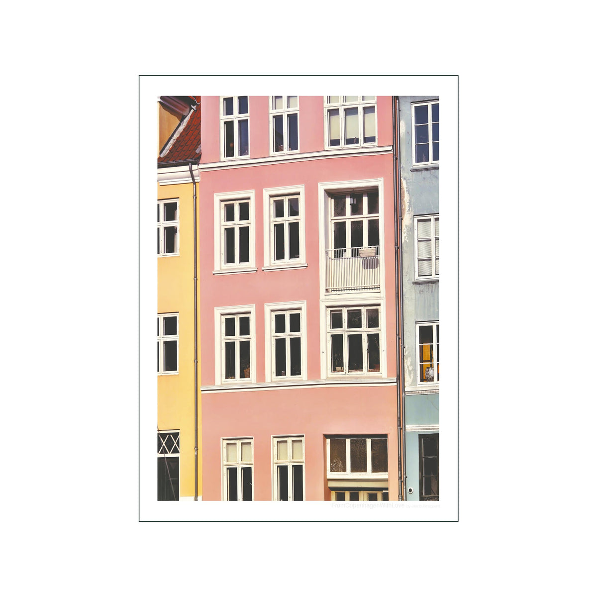 Pastel Copenhagen townhouse facades with white windows and narrow vertical architectural details