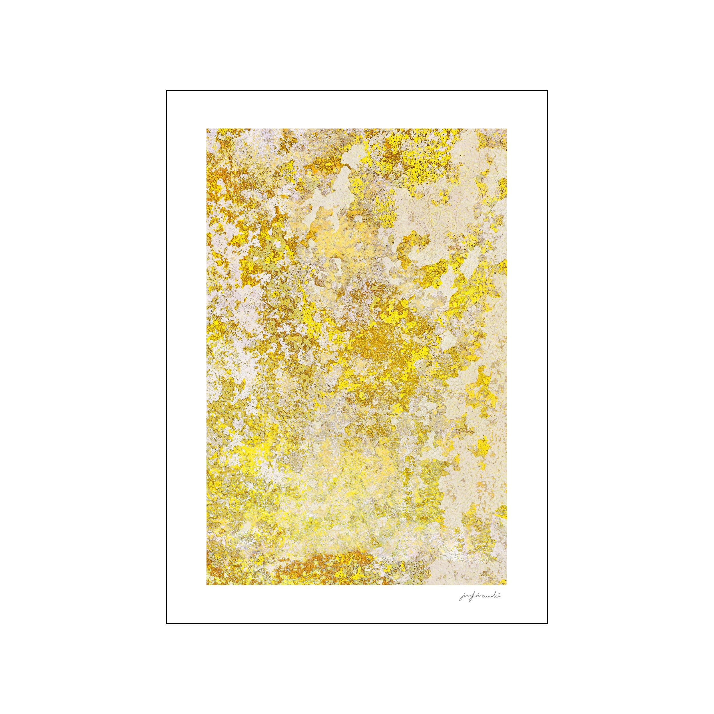Yellow and cream stone surface with layered mineral texture and abstract pattern