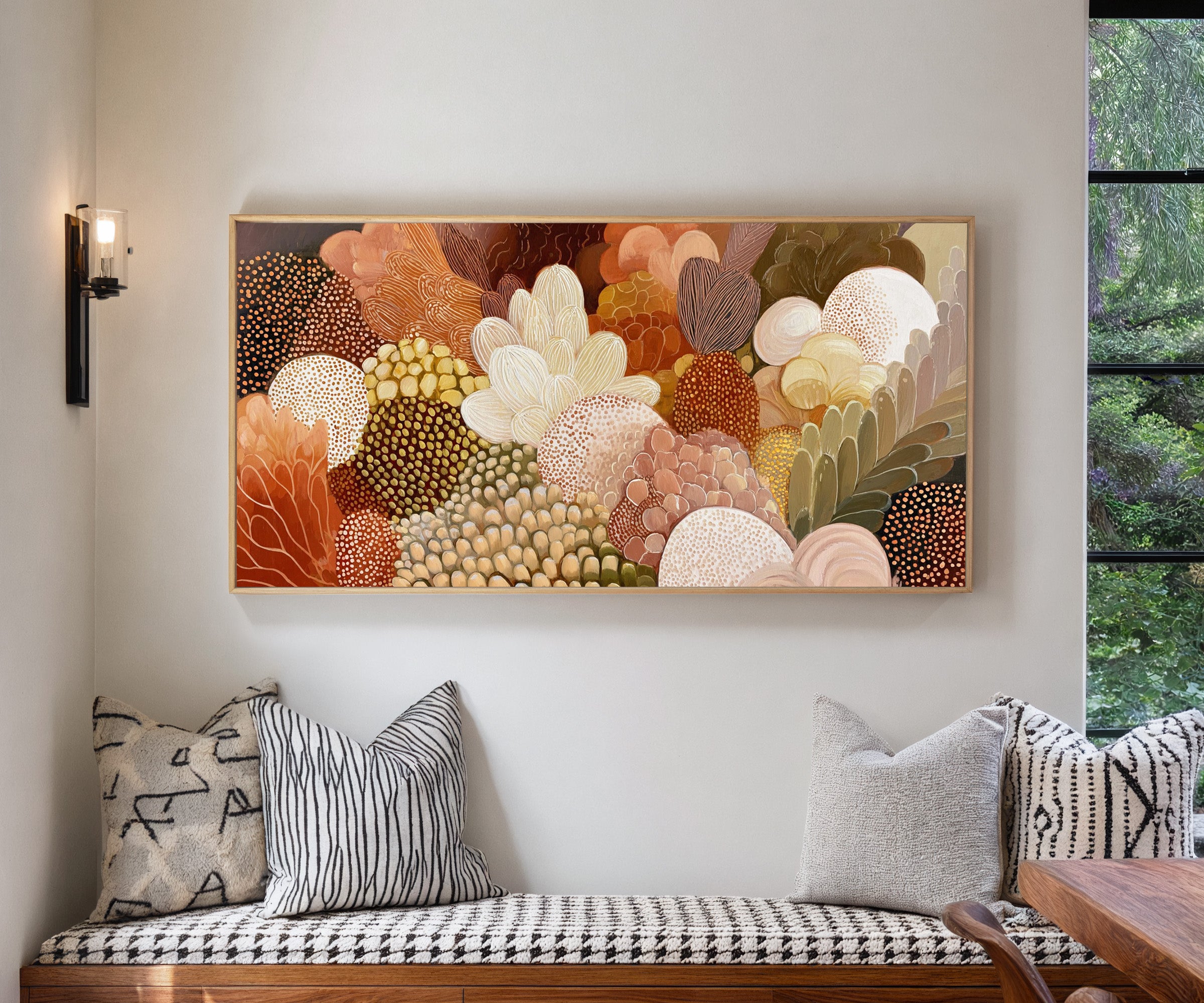 dense layered botanical forms in warm neutrals, canvas wall art in a natural wood frame in a living room