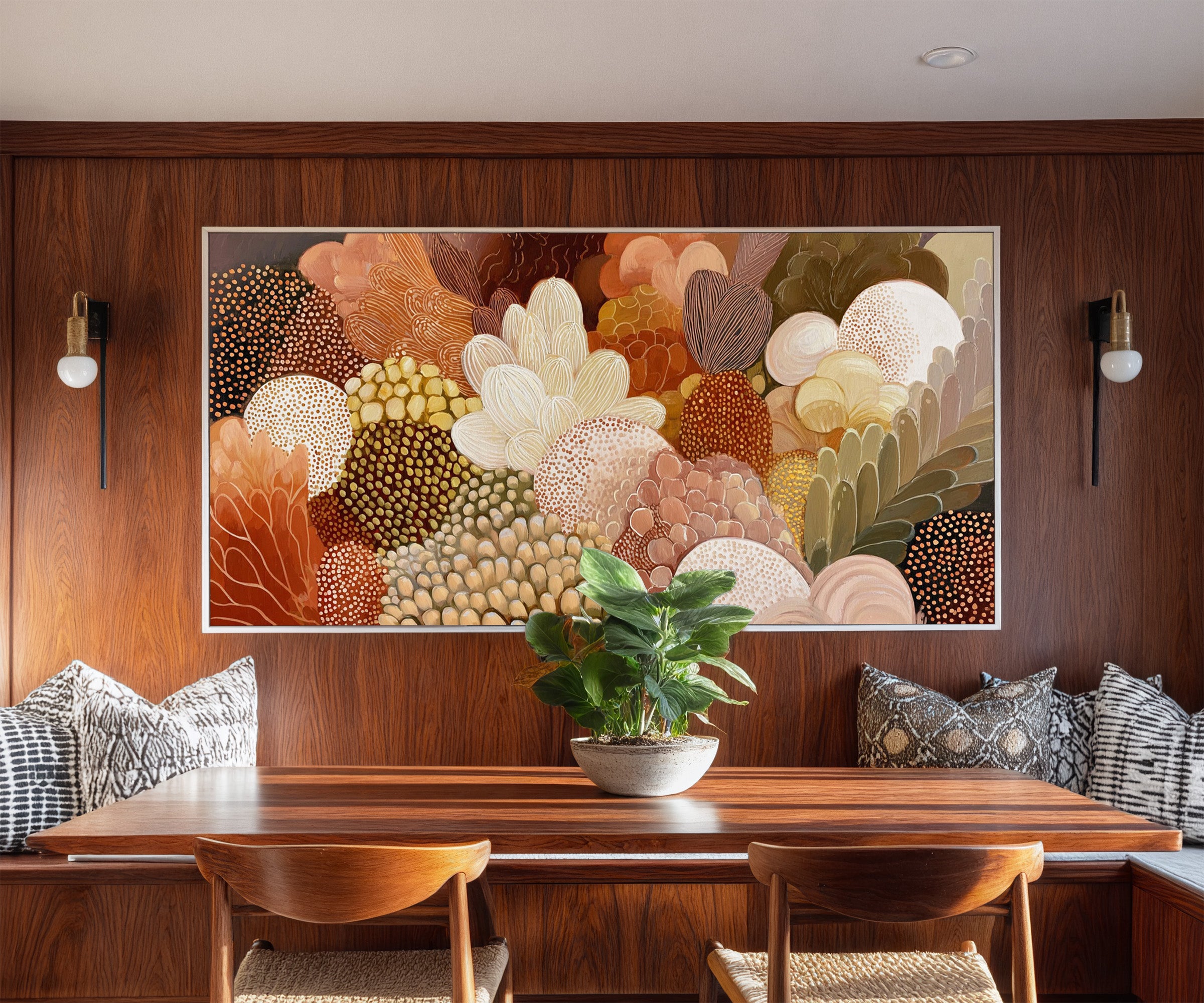 dense layered botanical forms in warm neutrals, canvas wall art in a white frame in a styled room setting