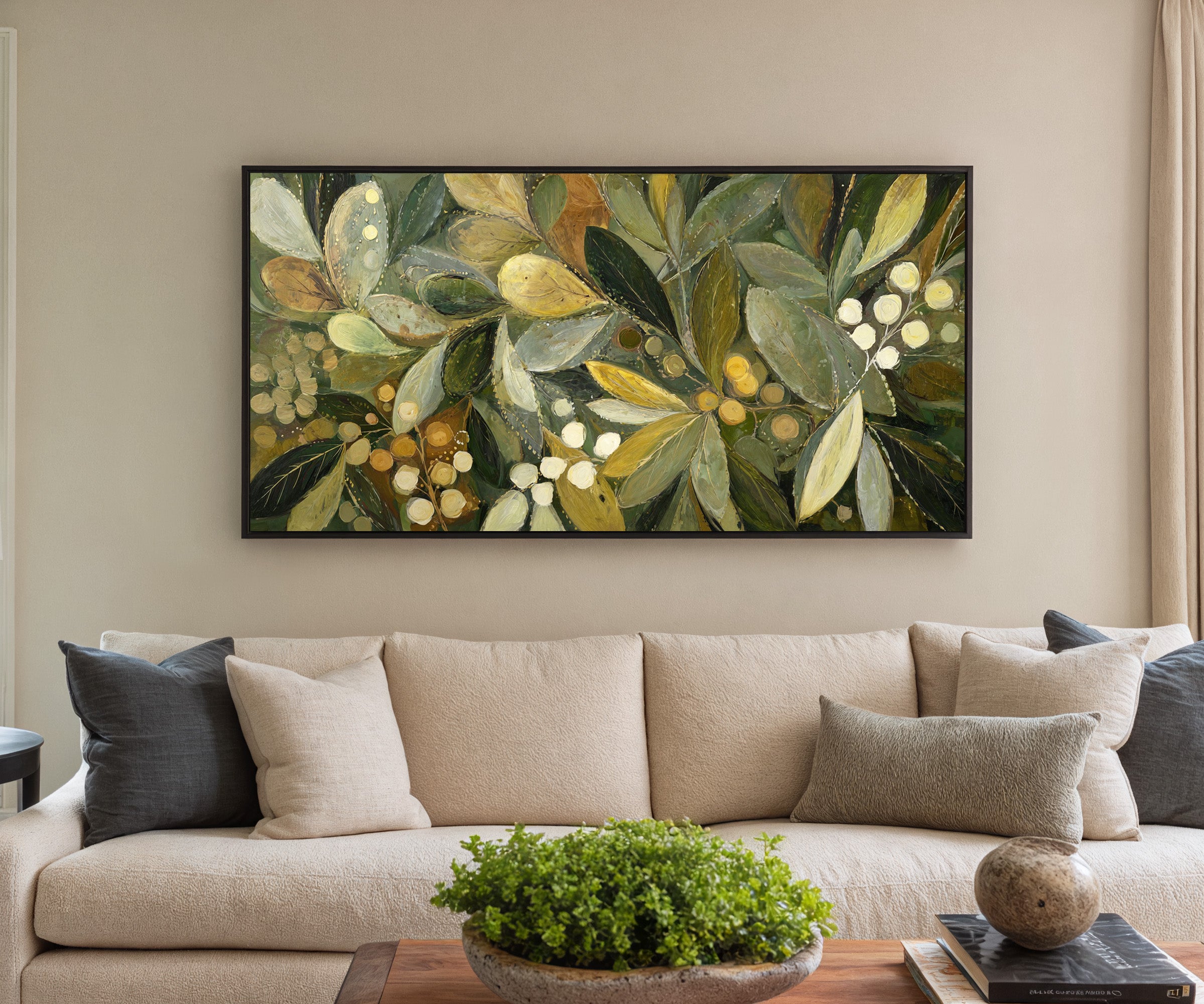 layered olive leaves with pale berries canvas wall art in a black frame in a styled room setting