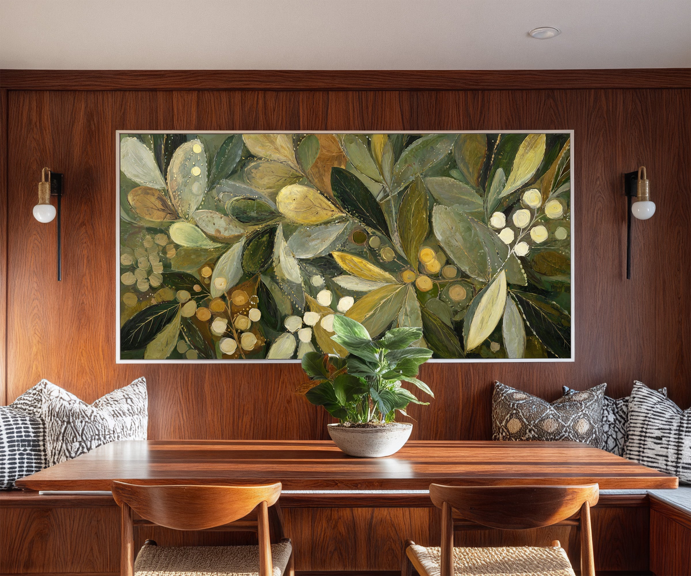 layered olive leaves with pale berries canvas wall art in a white frame in a styled room setting