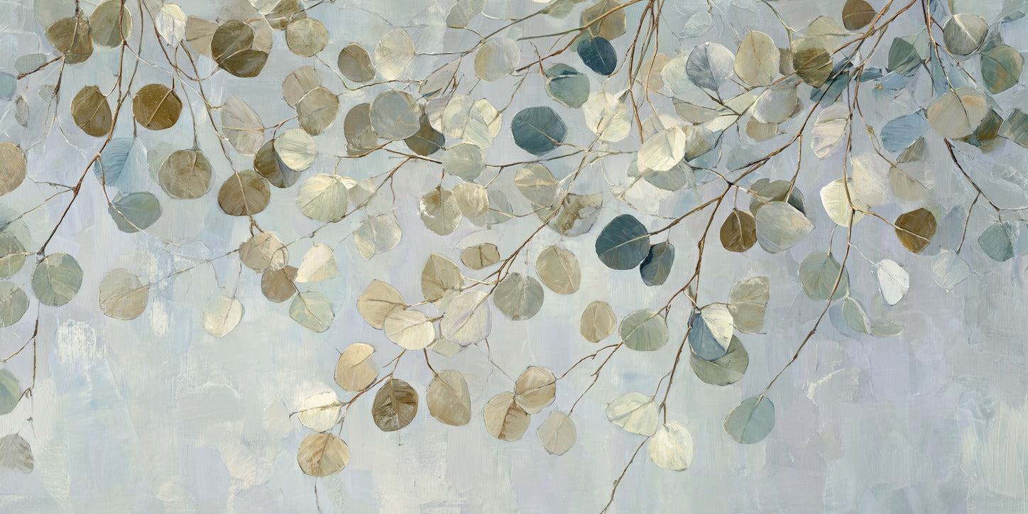 Pale eucalyptus leaves on thin brown stems spread across a light blue gray ground