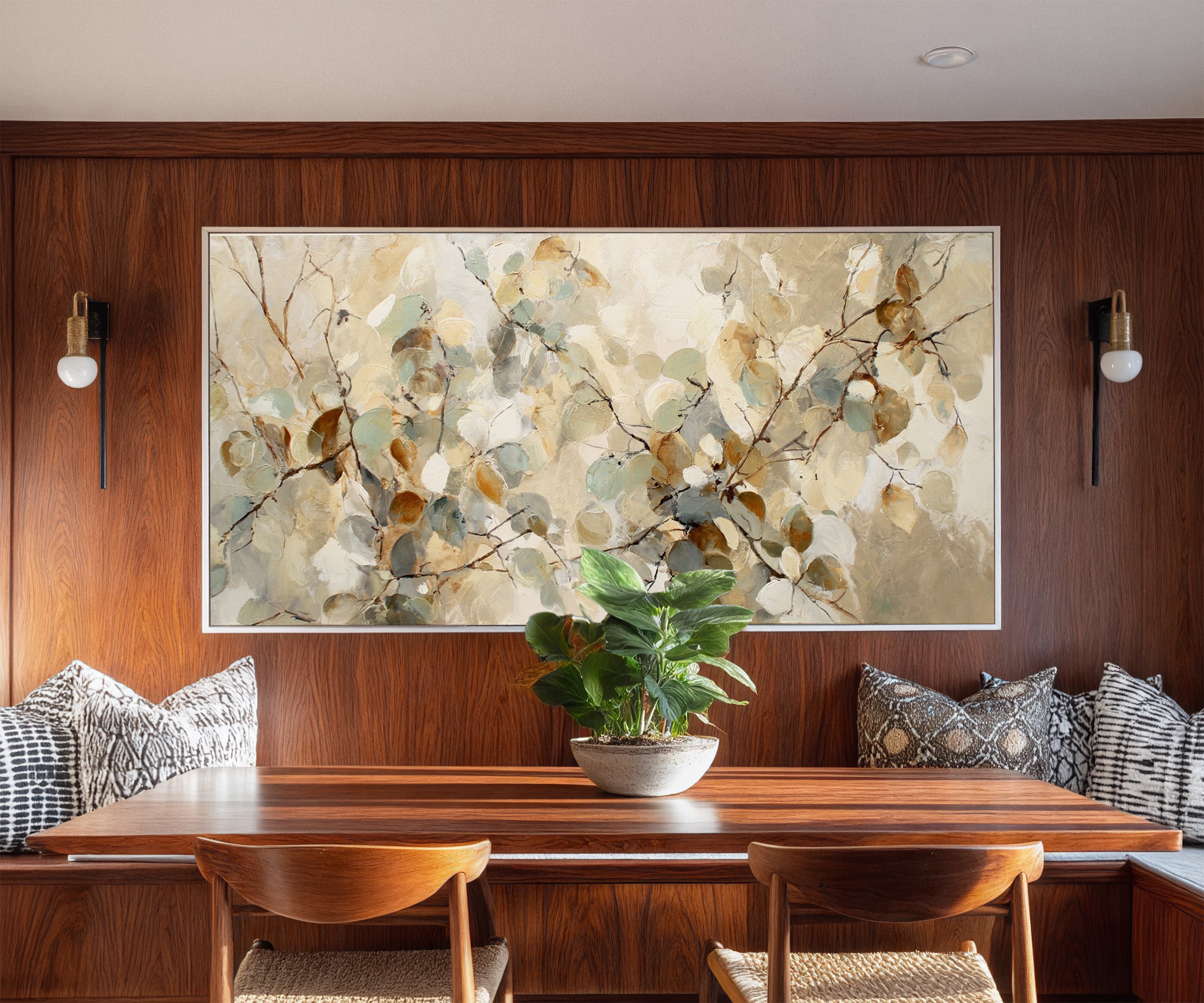 soft eucalyptus leaves in cream, sage, blue canvas wall art in a white frame in a styled room setting
