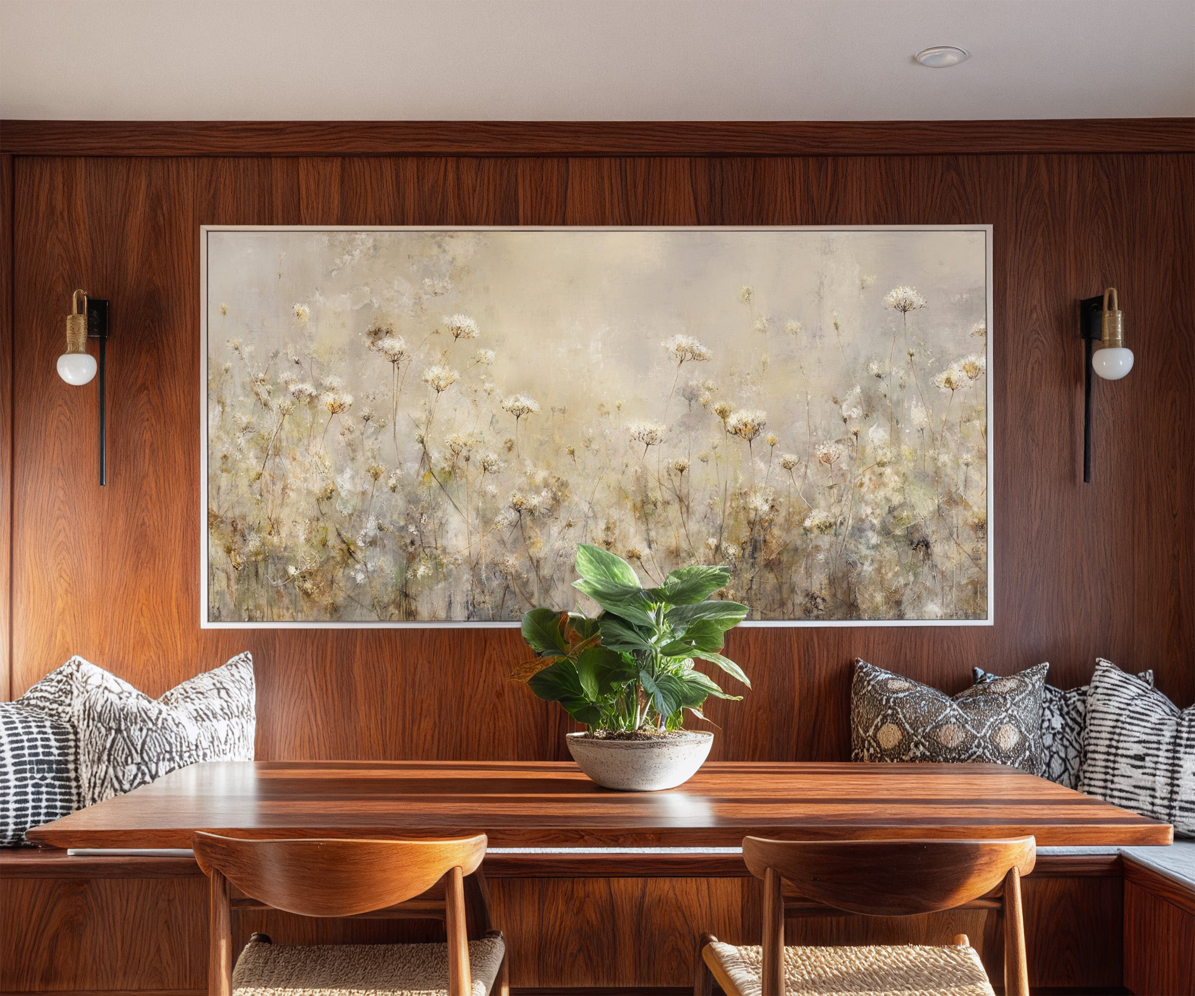 pale wildflower meadow with tall stems and soft canvas wall art in a white frame in a styled room setting