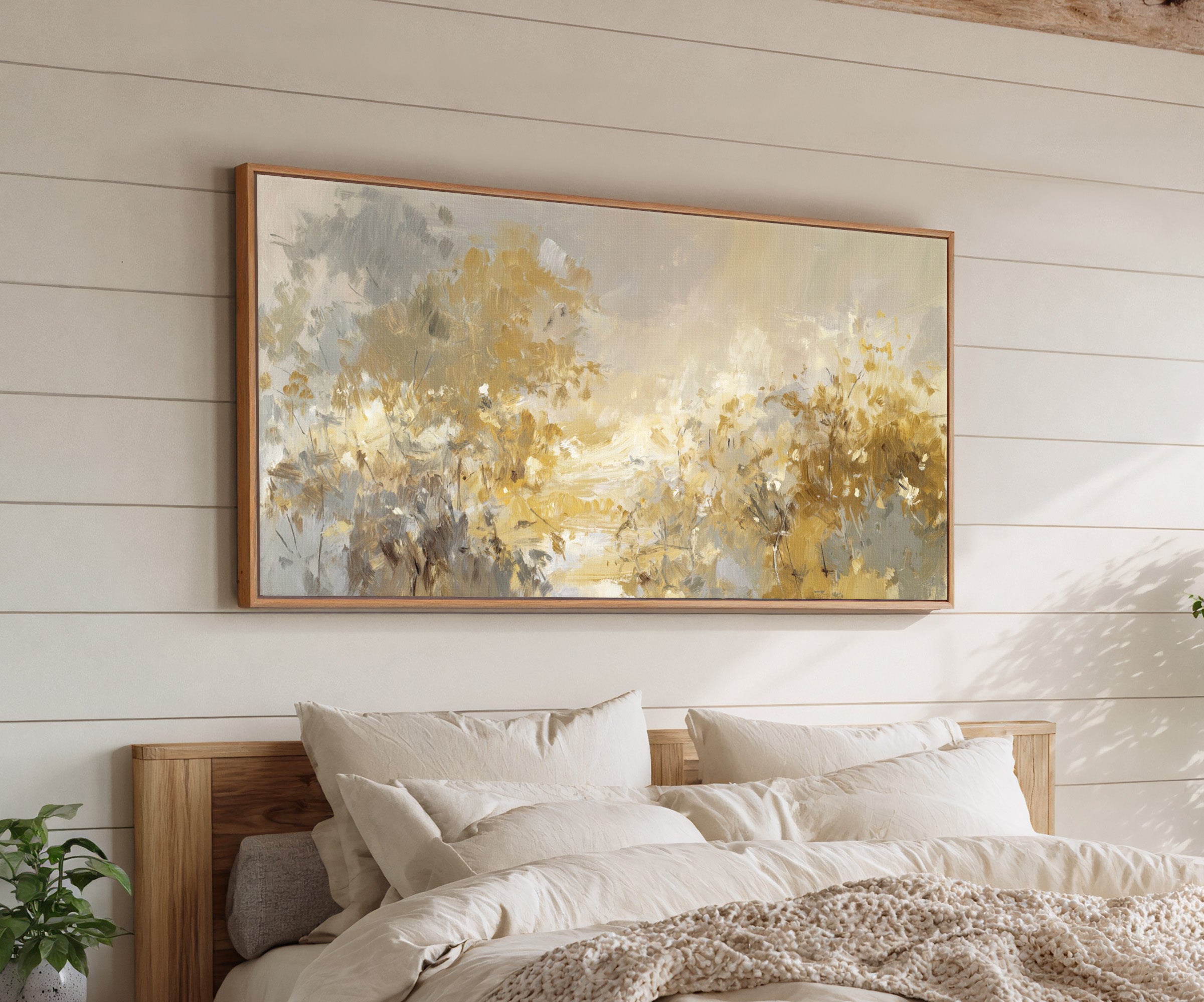 soft gold and gray floral layers canvas wall art in an oak frame above a bed