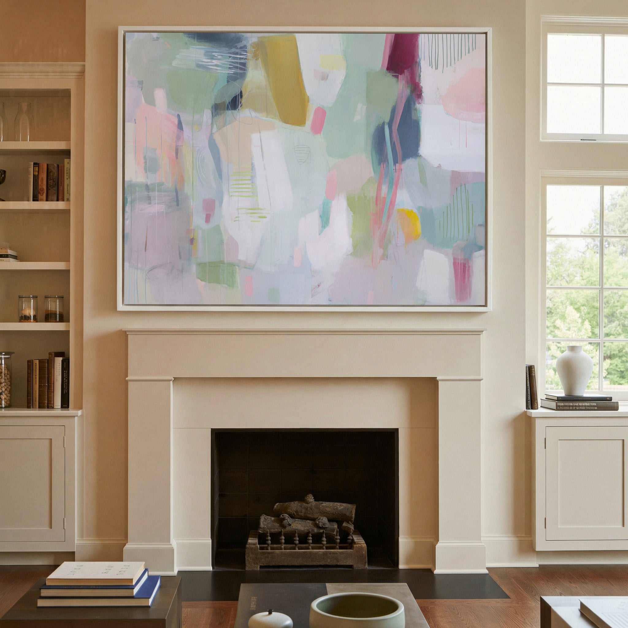 soft pastel abstract with vertical marks and canvas wall art in a white frame above a mantel