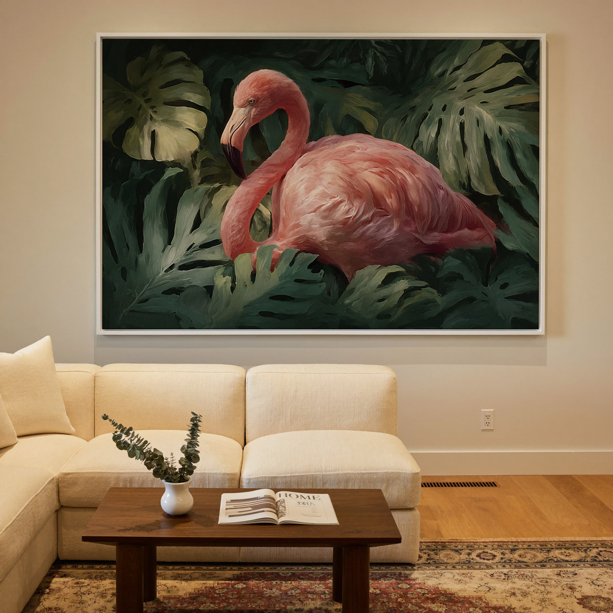 pink flamingo among dark green leaves canvas wall art in a white frame in a styled room setting