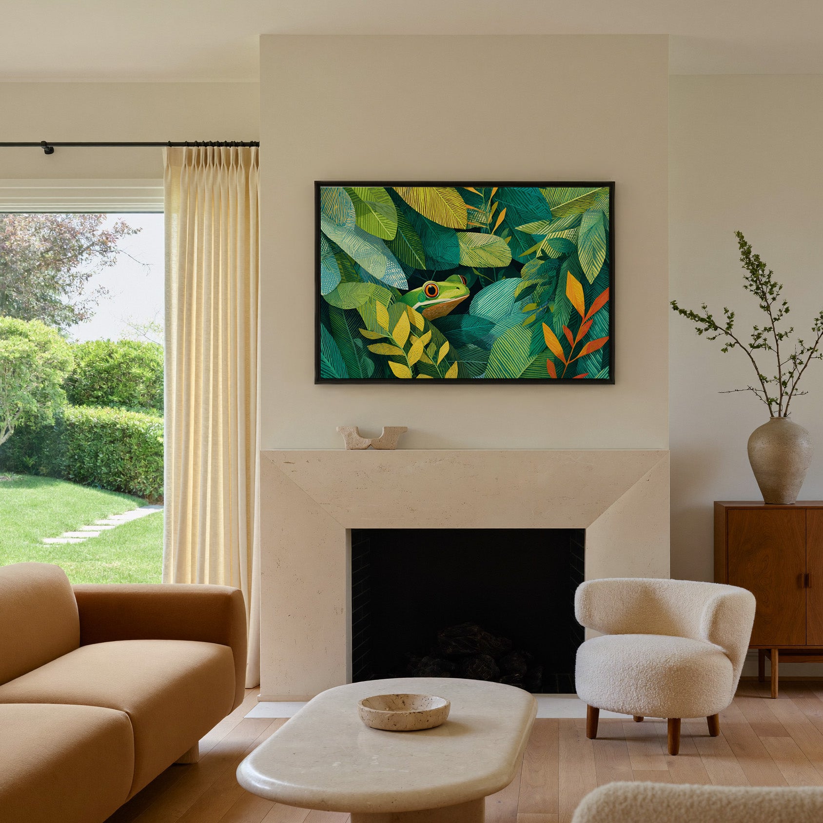 green frog among layered tropical leaves canvas wall art in a black frame above a mantel