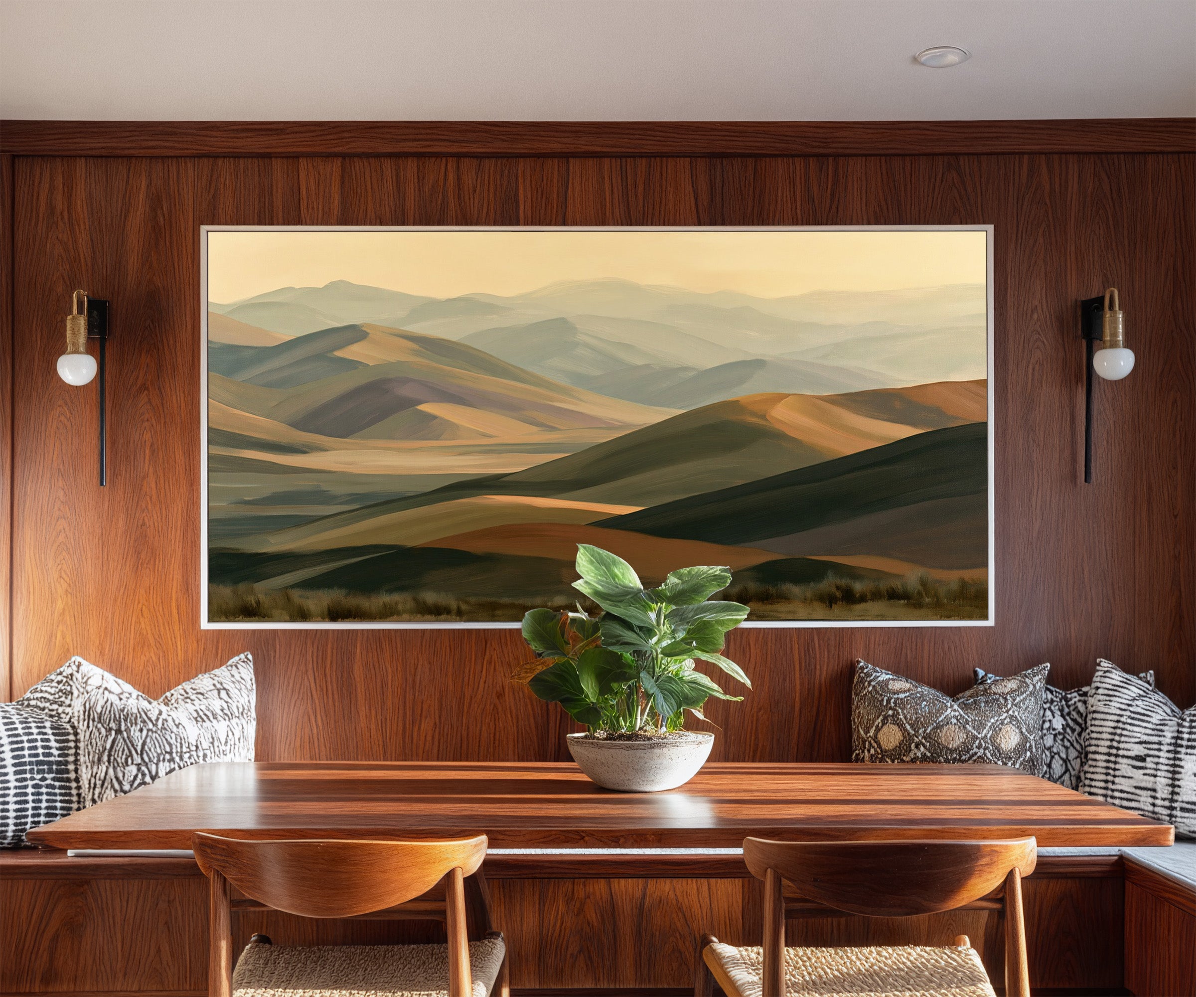 layered mountain ridges in muted gold and sage canvas wall art in a white frame in a styled room setting