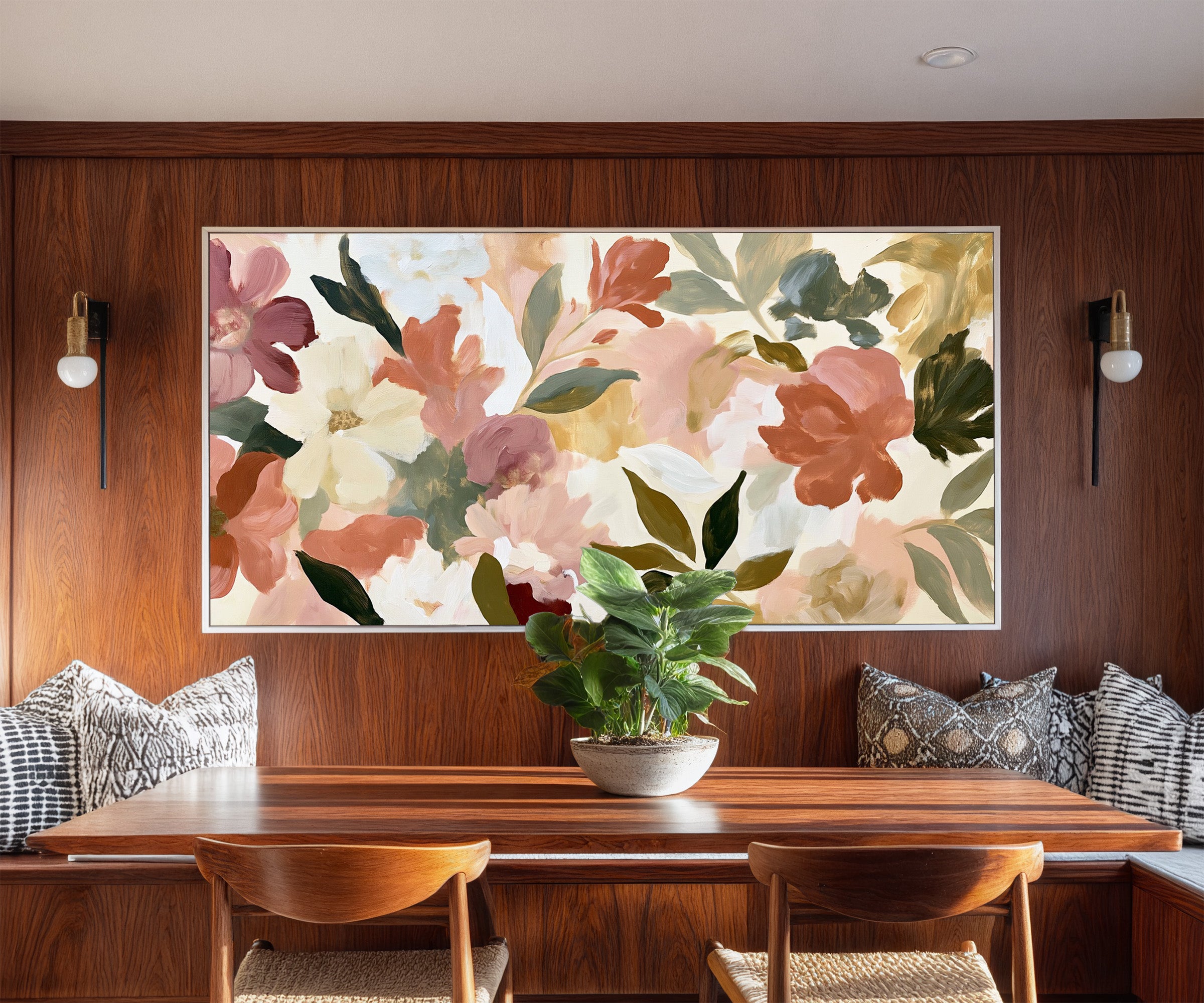 soft blush, cream, and terracotta floral forms canvas wall art in a white frame in a styled room setting