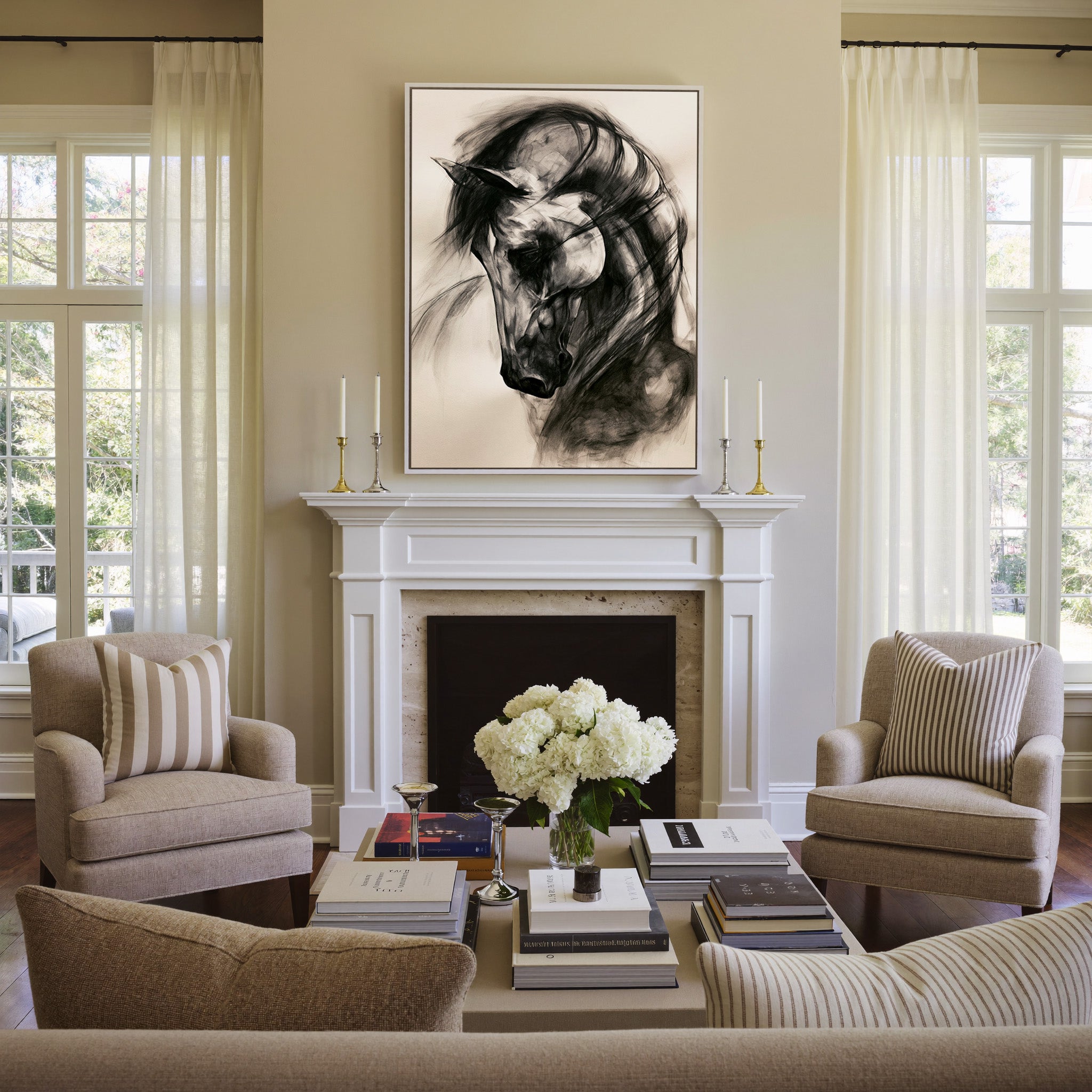 black and white horse portrait with sweeping canvas wall art in a white frame above a mantel