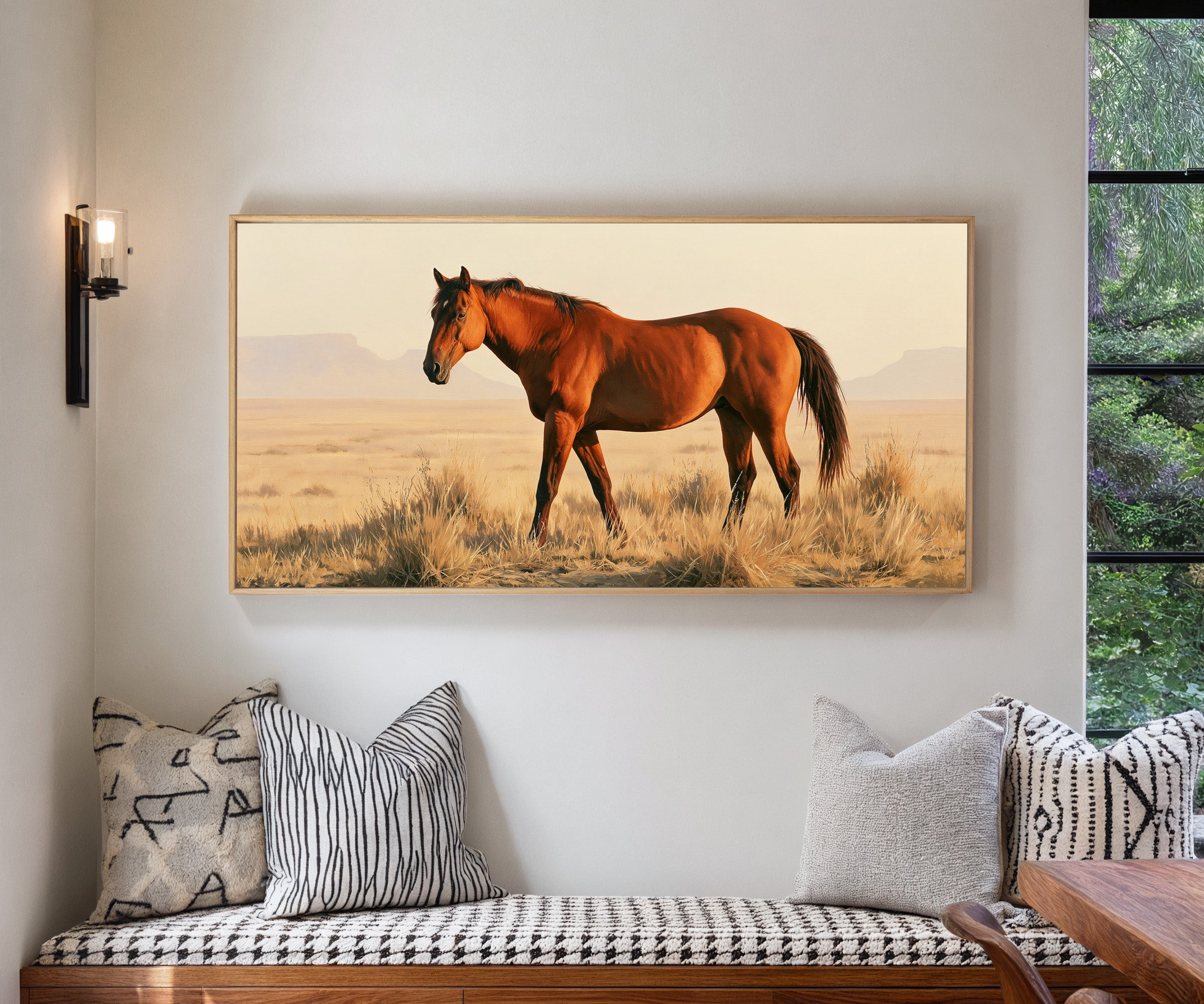 chestnut horse in dry desert grass canvas wall art in a natural wood frame in a living room