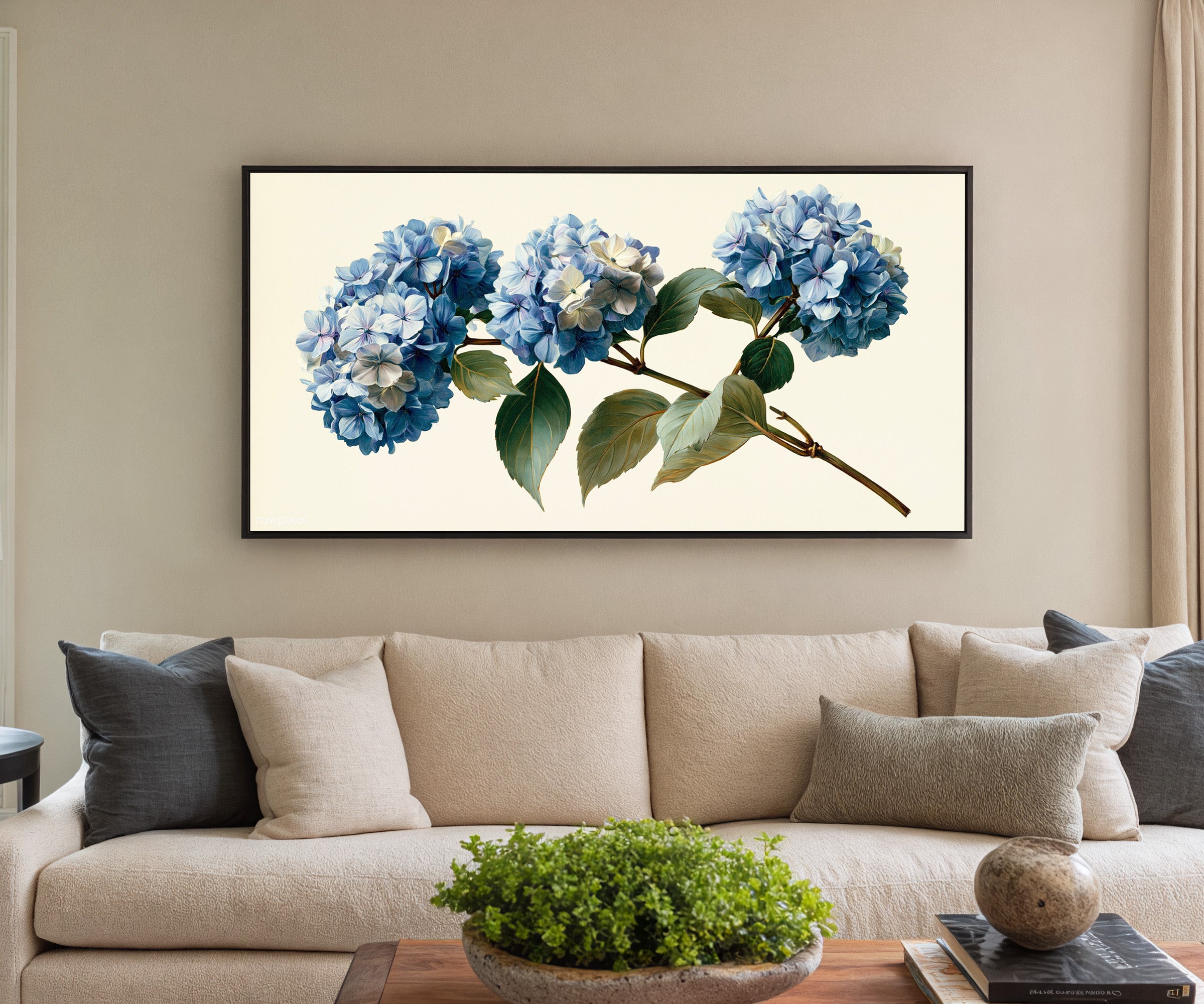 single blue hydrangea stem with clustered blooms canvas wall art in a black frame in a styled room setting