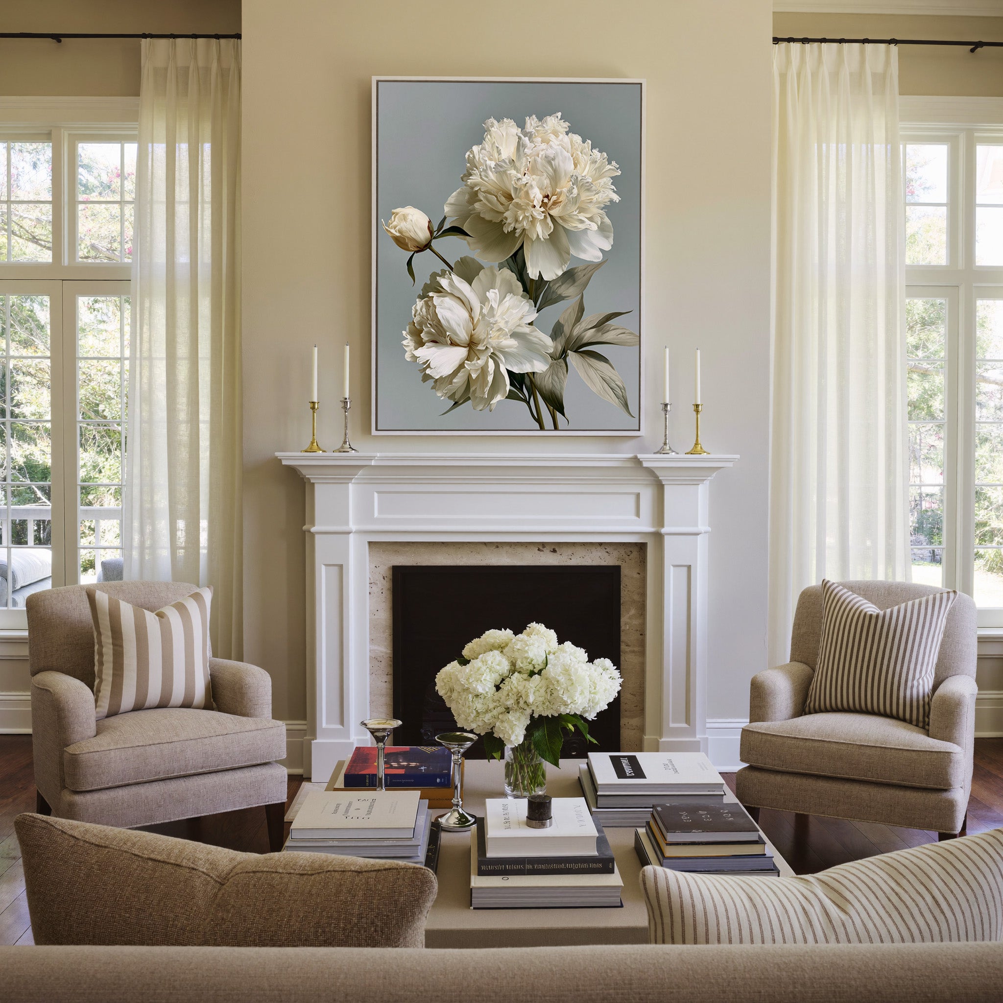 cream peonies with pale green leaves canvas wall art in a white frame above a mantel