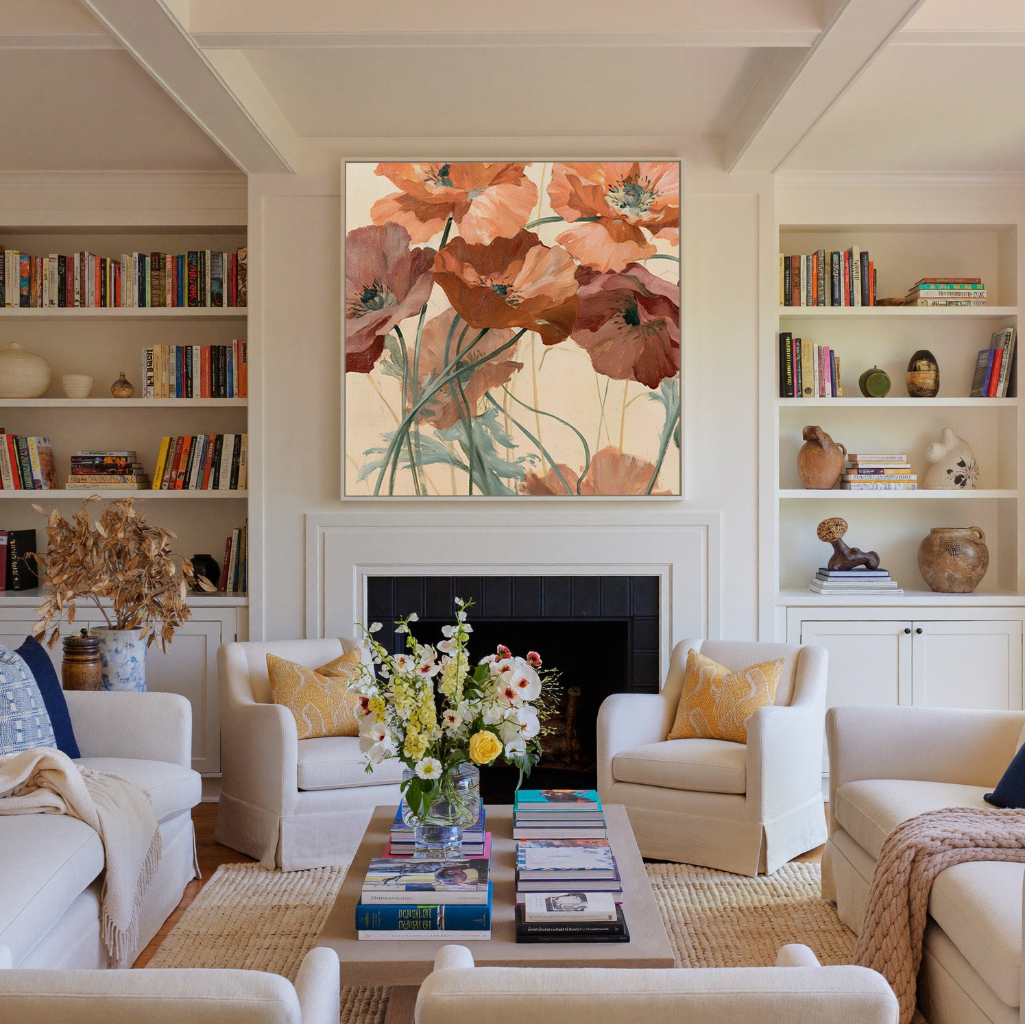 apricot and rust poppy flowers with thin green canvas wall art in a white frame above a fireplace