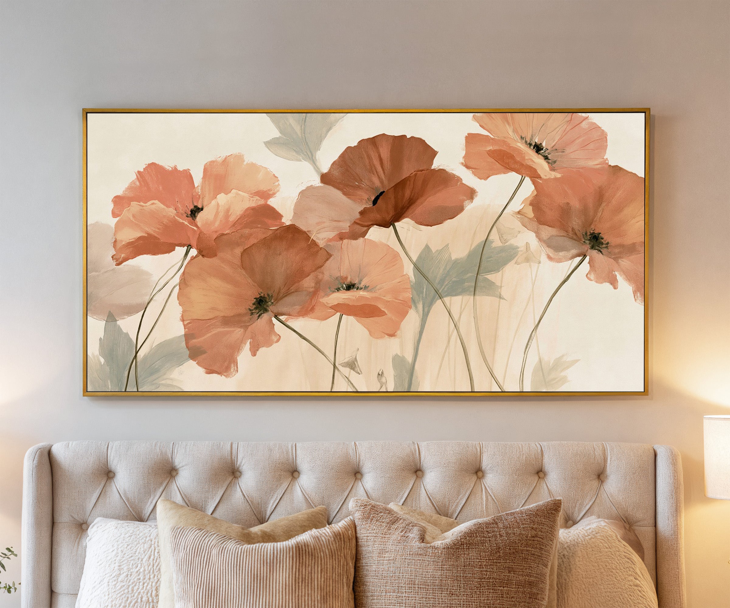 soft coral poppy flowers canvas wall art in a gold frame above a bed, with clear frame and room context