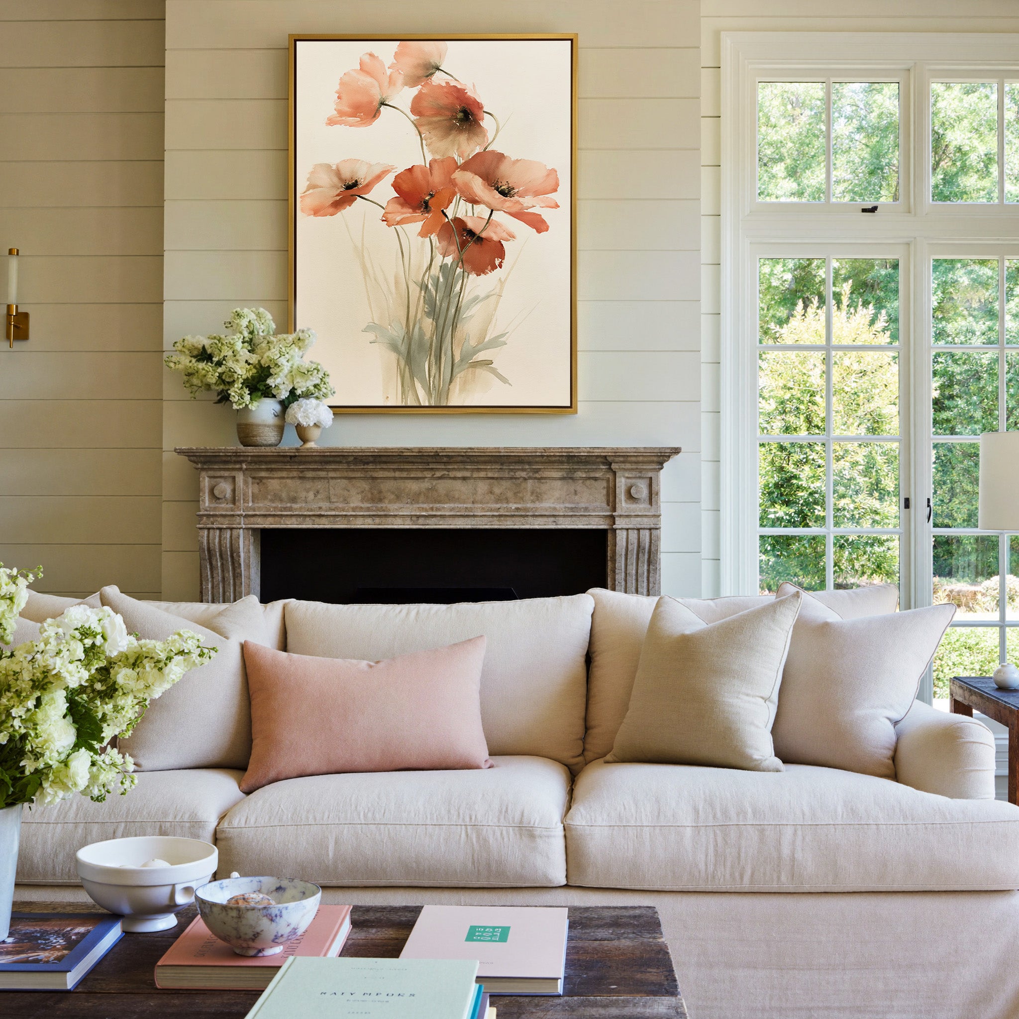 soft coral poppy flowers with thin stems canvas wall art in a gold frame above a mantel